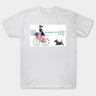 Girl on bike with Scottie dog riding on beach. T-Shirt